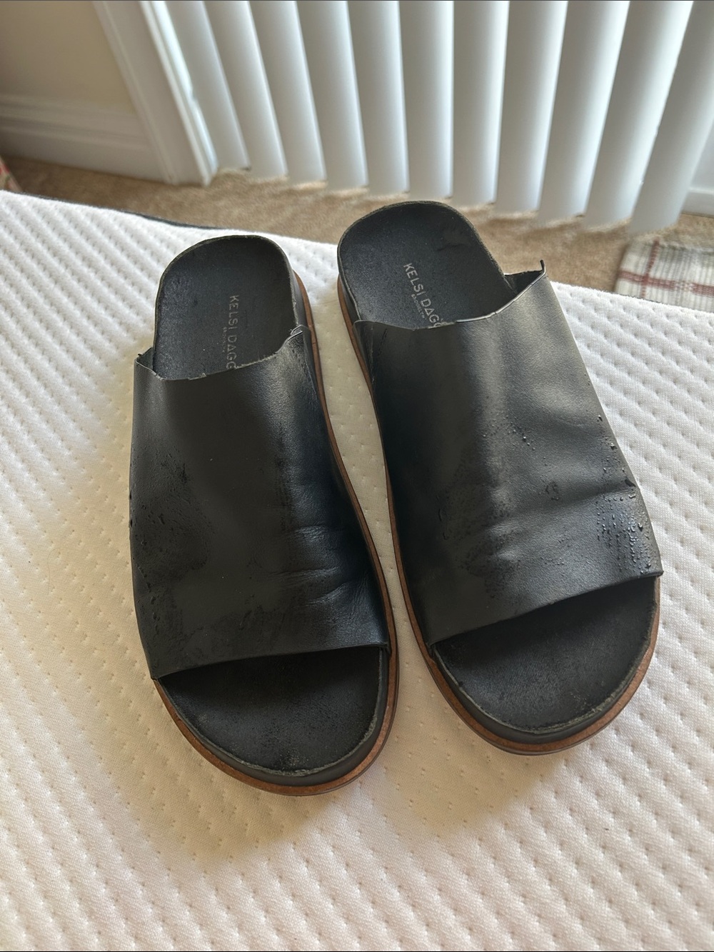 Kelsi Daggar black leather slides